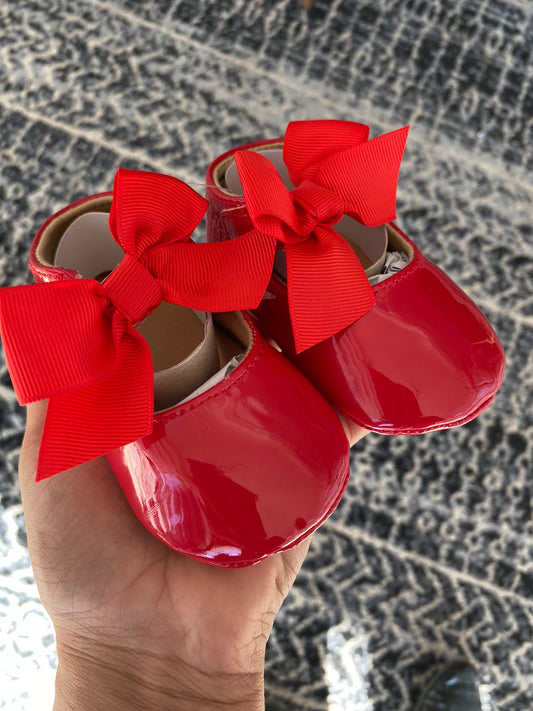 Zapatitos rojo moños