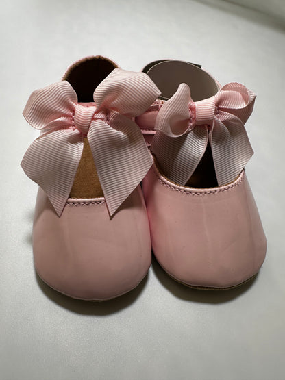 Zapatitos moño rosa